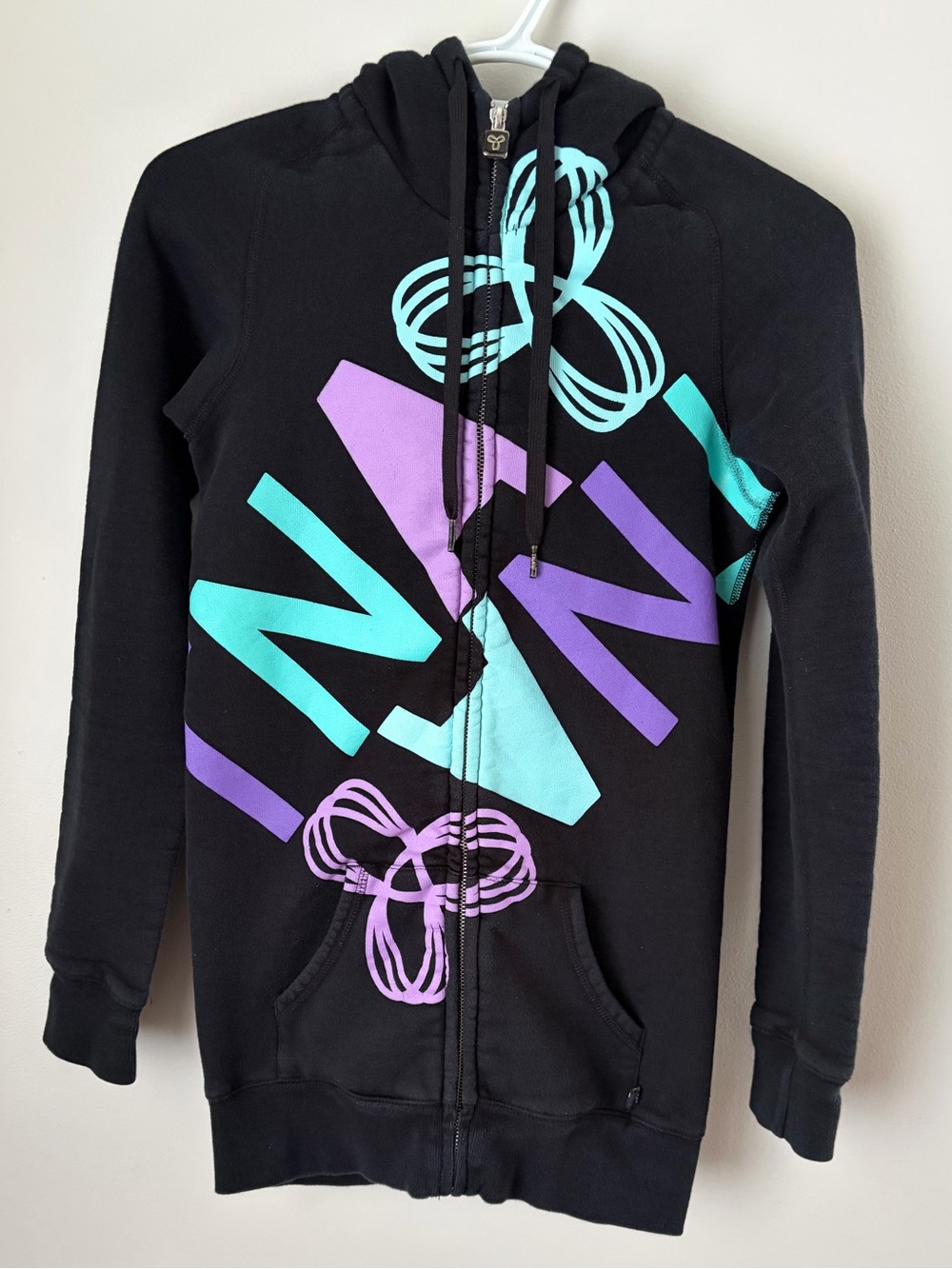 TNA Black Zip-Up Hoodie Sweater with Teal & Purple Graphic